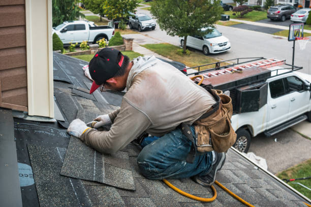 Professional Emergency Roof Repair technician working in Marietta, NY